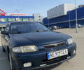 Синий Мазда 323, объемом двигателя 1.5 л и пробегом 330 тыс. км за 3000 $, фото 1 на Automoto.ua