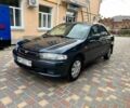 Синій Мазда 323, об'ємом двигуна 1.5 л та пробігом 1 тис. км за 1203 $, фото 1 на Automoto.ua