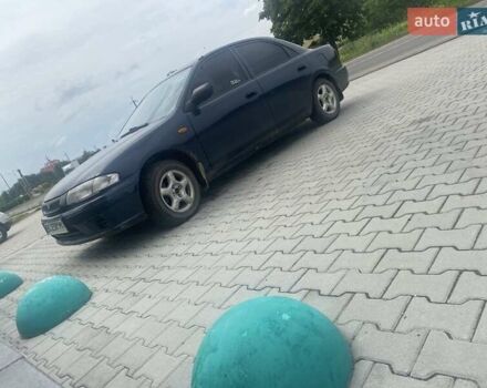 Синий Мазда 323, объемом двигателя 1.5 л и пробегом 430 тыс. км за 2200 $, фото 2 на Automoto.ua