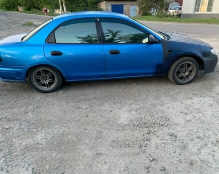 Синий Мазда 323, объемом двигателя 1.8 л и пробегом 275 тыс. км за 784 $, фото 1 на Automoto.ua