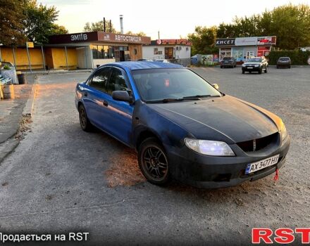 Синий Мазда 323, объемом двигателя 1.8 л и пробегом 250 тыс. км за 750 $, фото 8 на Automoto.ua