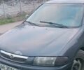 Синий Мазда 323, объемом двигателя 1.8 л и пробегом 440 тыс. км за 1100 $, фото 1 на Automoto.ua