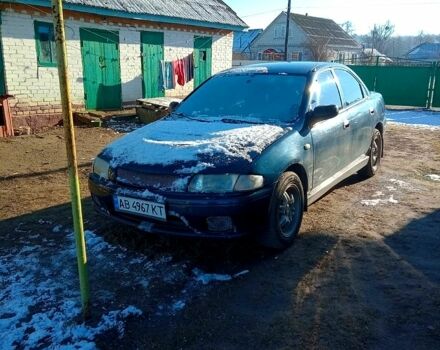 Синий Мазда 323, объемом двигателя 1.5 л и пробегом 300 тыс. км за 1750 $, фото 2 на Automoto.ua
