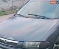 Синий Мазда 323, объемом двигателя 1.8 л и пробегом 440 тыс. км за 1300 $, фото 1 на Automoto.ua