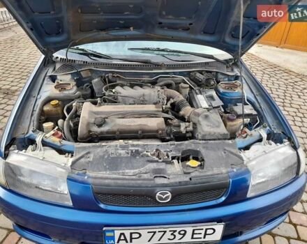 Синій Мазда 323, об'ємом двигуна 1.8 л та пробігом 238 тис. км за 3200 $, фото 2 на Automoto.ua