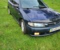 Синій Мазда 323, об'ємом двигуна 1.5 л та пробігом 345 тис. км за 1000 $, фото 1 на Automoto.ua