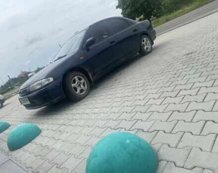 Синий Мазда 323, объемом двигателя 1.5 л и пробегом 430 тыс. км за 2200 $, фото 3 на Automoto.ua