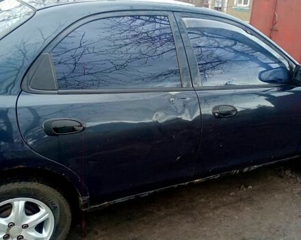 Синий Мазда 323, объемом двигателя 1.5 л и пробегом 500 тыс. км за 1500 $, фото 1 на Automoto.ua