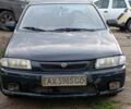 Синий Мазда 323, объемом двигателя 1.5 л и пробегом 1 тыс. км за 900 $, фото 1 на Automoto.ua
