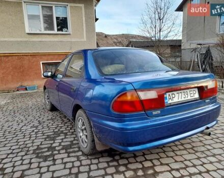 Синій Мазда 323, об'ємом двигуна 1.8 л та пробігом 238 тис. км за 3200 $, фото 7 на Automoto.ua