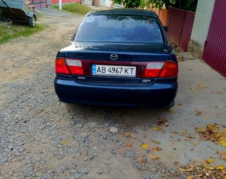 Синій Мазда 323, об'ємом двигуна 1.5 л та пробігом 0 тис. км за 1500 $, фото 1 на Automoto.ua