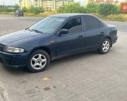 Синий Мазда 323, объемом двигателя 1.5 л и пробегом 430 тыс. км за 2200 $, фото 3 на Automoto.ua