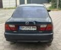Синий Мазда 323, объемом двигателя 1.5 л и пробегом 444 тыс. км за 1375 $, фото 5 на Automoto.ua