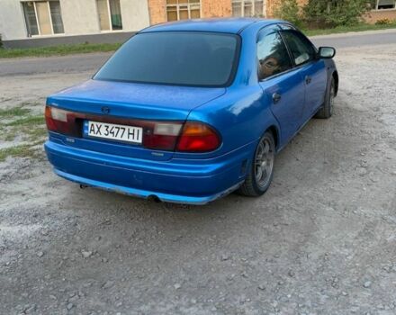 Синий Мазда 323, объемом двигателя 1.8 л и пробегом 275 тыс. км за 784 $, фото 2 на Automoto.ua