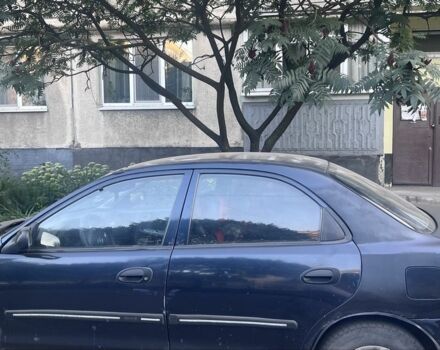 Синій Мазда 323, об'ємом двигуна 1.5 л та пробігом 300 тис. км за 2000 $, фото 4 на Automoto.ua