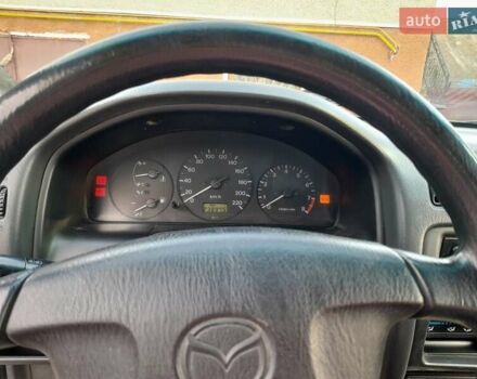 Синій Мазда 323, об'ємом двигуна 1.8 л та пробігом 238 тис. км за 3200 $, фото 4 на Automoto.ua