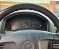Синій Мазда 323, об'ємом двигуна 1.8 л та пробігом 238 тис. км за 3200 $, фото 4 на Automoto.ua