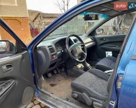 Синій Мазда 323, об'ємом двигуна 1.8 л та пробігом 238 тис. км за 3200 $, фото 3 на Automoto.ua