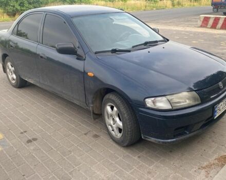 Синий Мазда 323, объемом двигателя 1.5 л и пробегом 430 тыс. км за 2200 $, фото 2 на Automoto.ua