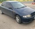 Синий Мазда 323, объемом двигателя 1.5 л и пробегом 430 тыс. км за 2200 $, фото 2 на Automoto.ua