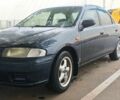 Синій Мазда 323, об'ємом двигуна 1.5 л та пробігом 420 тис. км за 1300 $, фото 1 на Automoto.ua