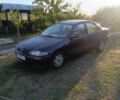Синий Мазда 323, объемом двигателя 1.5 л и пробегом 285 тыс. км за 990 $, фото 1 на Automoto.ua