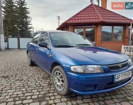 Синій Мазда 323, об'ємом двигуна 1.8 л та пробігом 238 тис. км за 3200 $, фото 9 на Automoto.ua