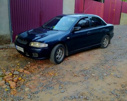 Синій Мазда 323, об'ємом двигуна 1.5 л та пробігом 0 тис. км за 1500 $, фото 4 на Automoto.ua