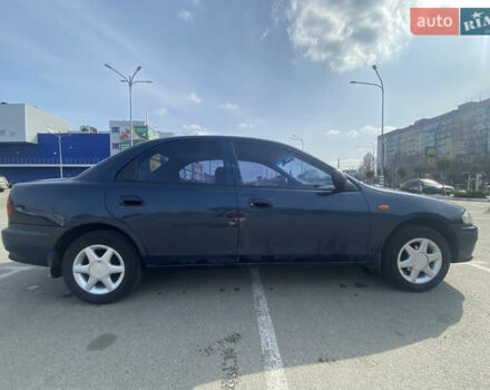 Синий Мазда 323, объемом двигателя 1.5 л и пробегом 330 тыс. км за 3000 $, фото 3 на Automoto.ua
