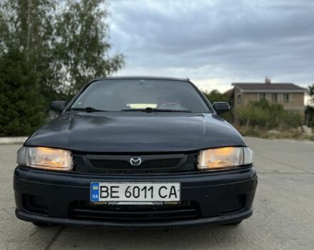 Синий Мазда 323, объемом двигателя 1.5 л и пробегом 200 тыс. км за 1350 $, фото 6 на Automoto.ua