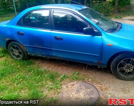 Синій Мазда 323, об'ємом двигуна 1.5 л та пробігом 340 тис. км за 800 $, фото 1 на Automoto.ua