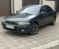 Синий Мазда 323, объемом двигателя 1.5 л и пробегом 444 тыс. км за 1375 $, фото 1 на Automoto.ua