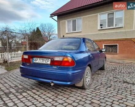 Синій Мазда 323, об'ємом двигуна 1.8 л та пробігом 238 тис. км за 3200 $, фото 6 на Automoto.ua