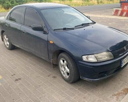 Синий Мазда 323, объемом двигателя 1.5 л и пробегом 430 тыс. км за 2200 $, фото 1 на Automoto.ua