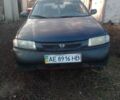 Синий Мазда 323, объемом двигателя 1.5 л и пробегом 387 тыс. км за 1354 $, фото 1 на Automoto.ua