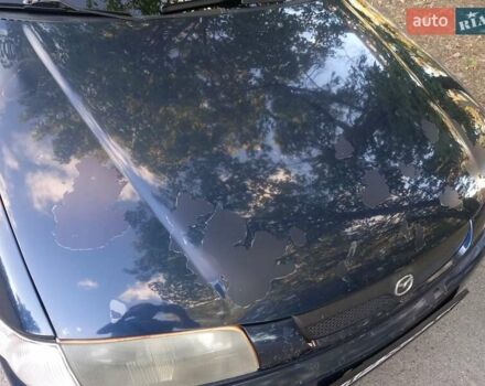 Синий Мазда 323, объемом двигателя 1.8 л и пробегом 443 тыс. км за 3300 $, фото 7 на Automoto.ua