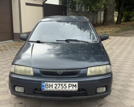 Синий Мазда 323, объемом двигателя 1.5 л и пробегом 444 тыс. км за 1375 $, фото 1 на Automoto.ua