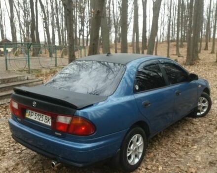 Синій Мазда 323, об'ємом двигуна 1.8 л та пробігом 340 тис. км за 2200 $, фото 1 на Automoto.ua