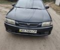 Синий Мазда 323, объемом двигателя 1.5 л и пробегом 285 тыс. км за 2500 $, фото 1 на Automoto.ua