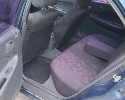 Синій Мазда 323, об'ємом двигуна 1.5 л та пробігом 70 тис. км за 1950 $, фото 9 на Automoto.ua