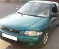 Синій Мазда 323, об'ємом двигуна 1.5 л та пробігом 132 тис. км за 1 $, фото 1 на Automoto.ua