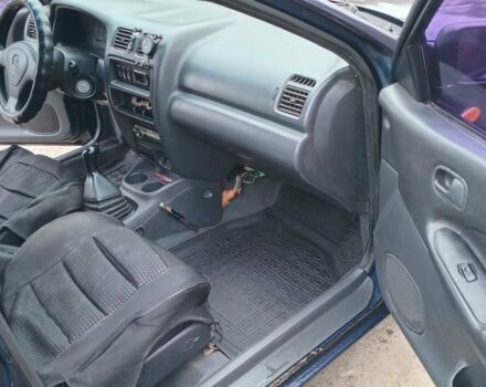 Синий Мазда 323, объемом двигателя 1.5 л и пробегом 74 тыс. км за 1950 $, фото 9 на Automoto.ua