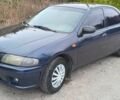 Синий Мазда 323, объемом двигателя 1.5 л и пробегом 74 тыс. км за 1950 $, фото 1 на Automoto.ua
