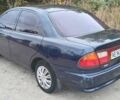 Синій Мазда 323, об'ємом двигуна 1.5 л та пробігом 70 тис. км за 1950 $, фото 2 на Automoto.ua