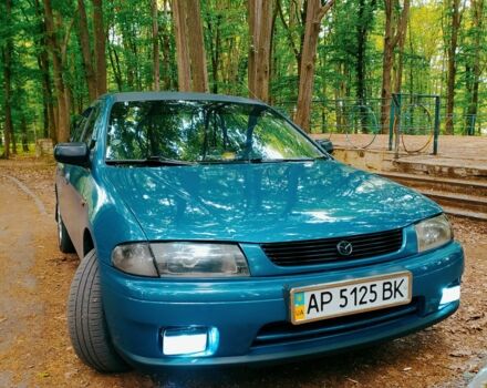 Синій Мазда 323, об'ємом двигуна 1.8 л та пробігом 340 тис. км за 2200 $, фото 10 на Automoto.ua