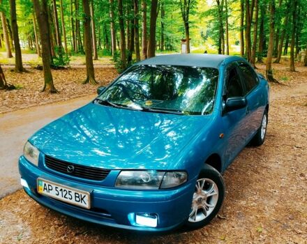 Синій Мазда 323, об'ємом двигуна 1.8 л та пробігом 340 тис. км за 2200 $, фото 11 на Automoto.ua