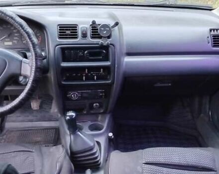 Синій Мазда 323, об'ємом двигуна 1.5 л та пробігом 70 тис. км за 1950 $, фото 7 на Automoto.ua