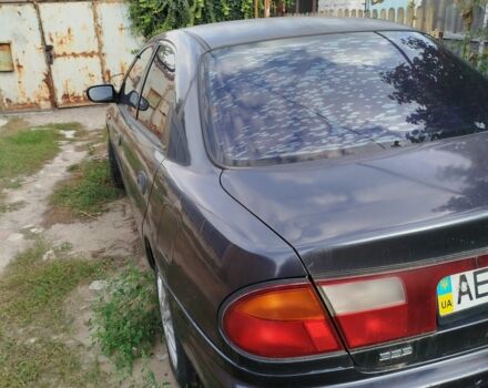 Синий Мазда 323, объемом двигателя 1.5 л и пробегом 400 тыс. км за 2574 $, фото 3 на Automoto.ua