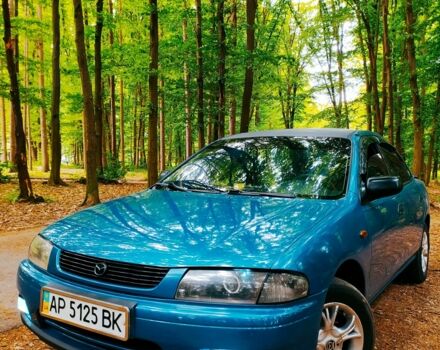 Синій Мазда 323, об'ємом двигуна 1.8 л та пробігом 340 тис. км за 2200 $, фото 12 на Automoto.ua