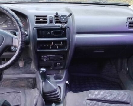 Синий Мазда 323, объемом двигателя 1.5 л и пробегом 74 тыс. км за 1950 $, фото 7 на Automoto.ua